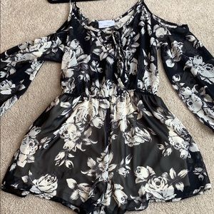 Off the shoulder black floral romper